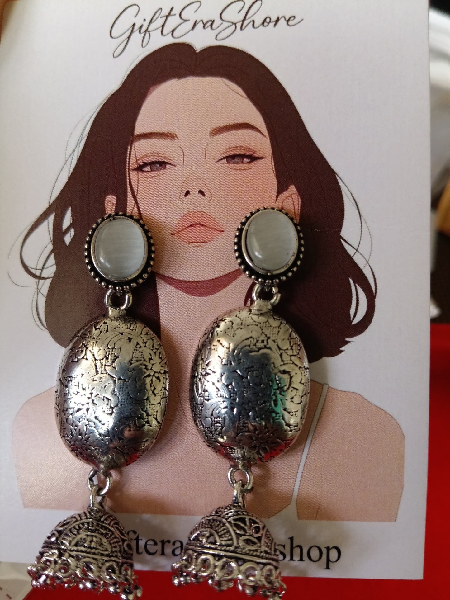 Oxidized Silver Oval Jhumka Earrings - White Cats Eye